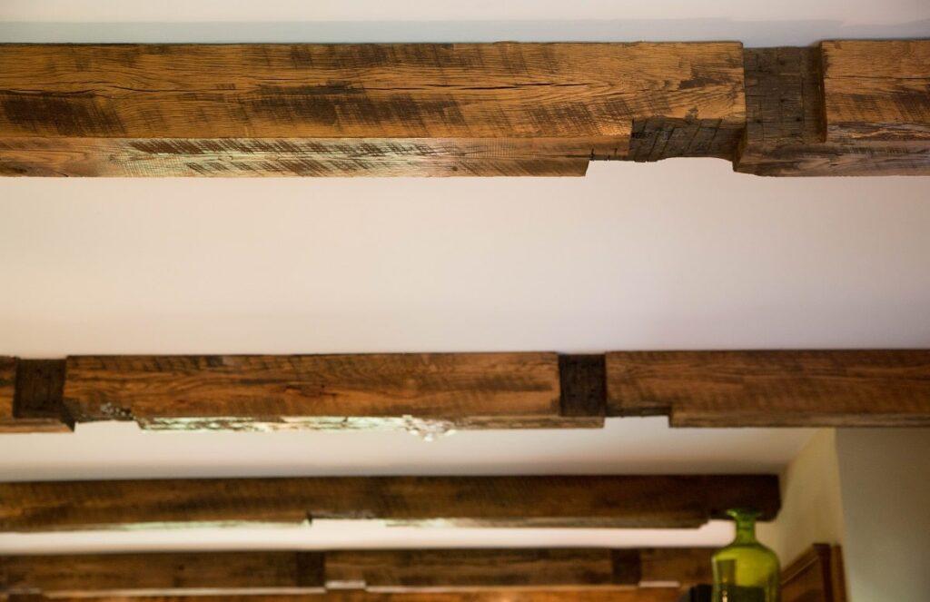 installed custom antique reclaimed rough sawn beams