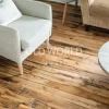 Reclaimed Industrial Oak flooring adding warmth and texture to a cozy living room with neutral-toned furniture.
