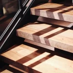 reclaimed timber stair treads with steel glass stair railing