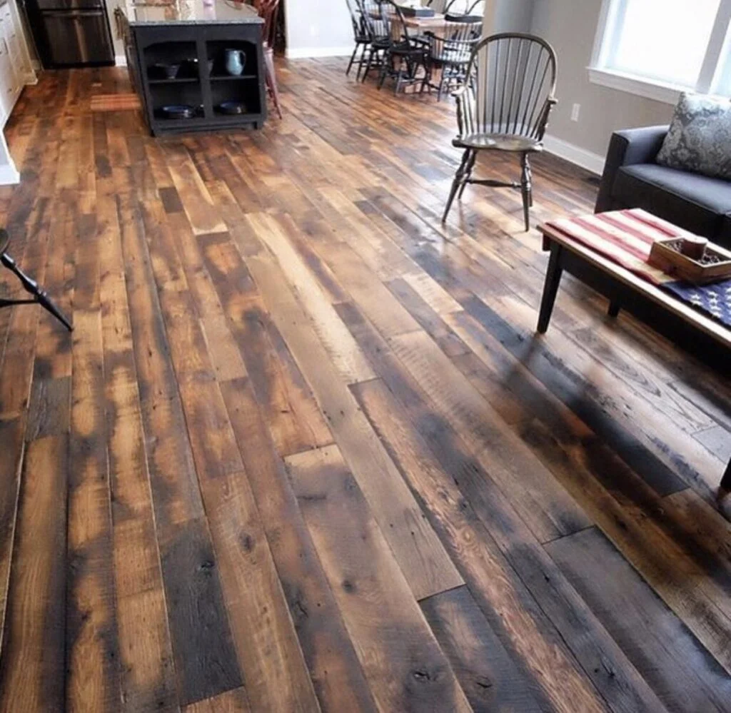 Reclaimed barnwood oak skip-planed tongue and groove solid flooring in a living room