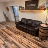 fence oak engineered flooring skip planed and wirebrushed living room with dark brown sofa