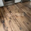 Kitchen floor angle with Old World Timber’s Heartland Barnwood engineered planks featuring reclaimed patina, nail holes, and warmth.