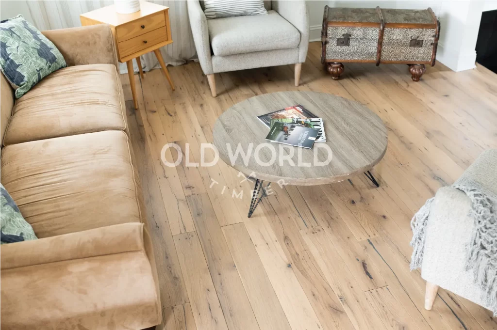 Detailed view of reclaimed white oak flooring planks featuring a clean face, sourced from antique industrial factories.