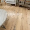 Engineered flooring made from reclaimed white oak, showing rich tones and tight grain from industrial warehouse wood.