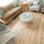 Elegant reclaimed oak engineered flooring with a clean face and warm industrial-era character.