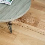 Close-up of Modern Harvest oak planks beside a Frigidaire stove, showcasing filled cracks and sustainable craftsmanship.