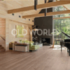 Rift and quartered oak engineered floors in an open-concept living room with modern architectural details.
