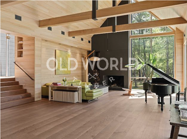 Rift and quartered oak engineered floors in an open-concept living room with modern architectural details.