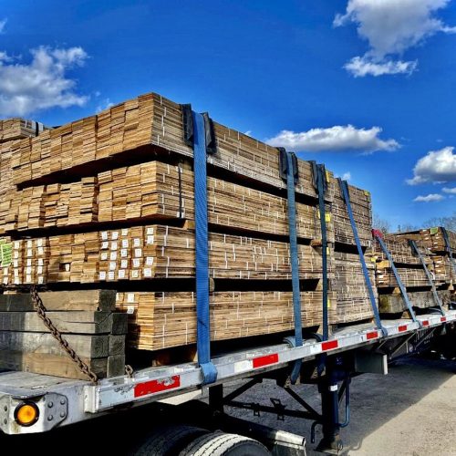 A lumber delivery on a truck