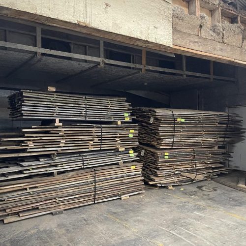 stored kiln dried timber planks