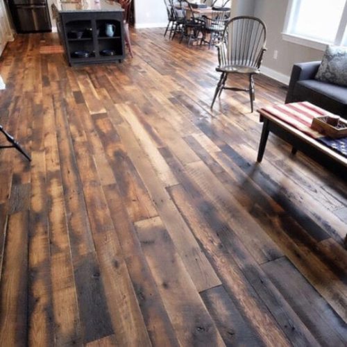 reclaimed barnwood oak skip-planed tongue and groove solid flooring in a living room