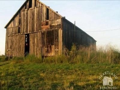 an old antique wood gray barn ready to be recycled, reclaimed and repurposed into interior design products to last for many more years