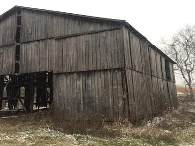 an old antique wood gray barn ready to be recycled, reclaimed and repurposed into interior design products to last for many more years