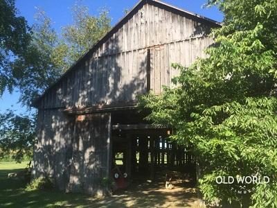 an old antique wood gray barn ready to be recycled, reclaimed and repurposed into interior design products to last for many more years